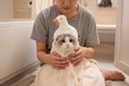 Load image into Gallery viewer, Duck Plush Hood — lifestyle photo