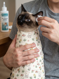 Load image into Gallery viewer, Floral Rabbit Wrap — lifestyle photo
